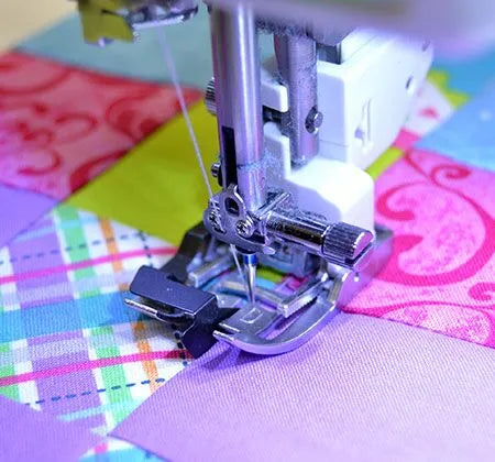 Janome Naadquiltvoet "SD" met middengeleider (acufeed breed 9mm)