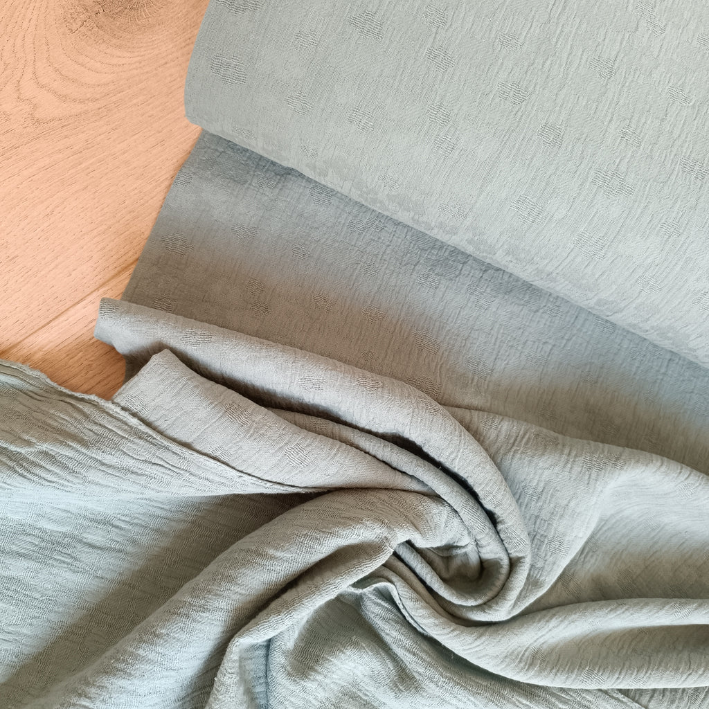 Double gauze melange jacquard oudgroen
