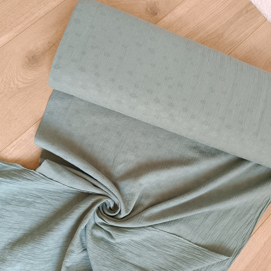 Double gauze melange jacquard oudgroen
