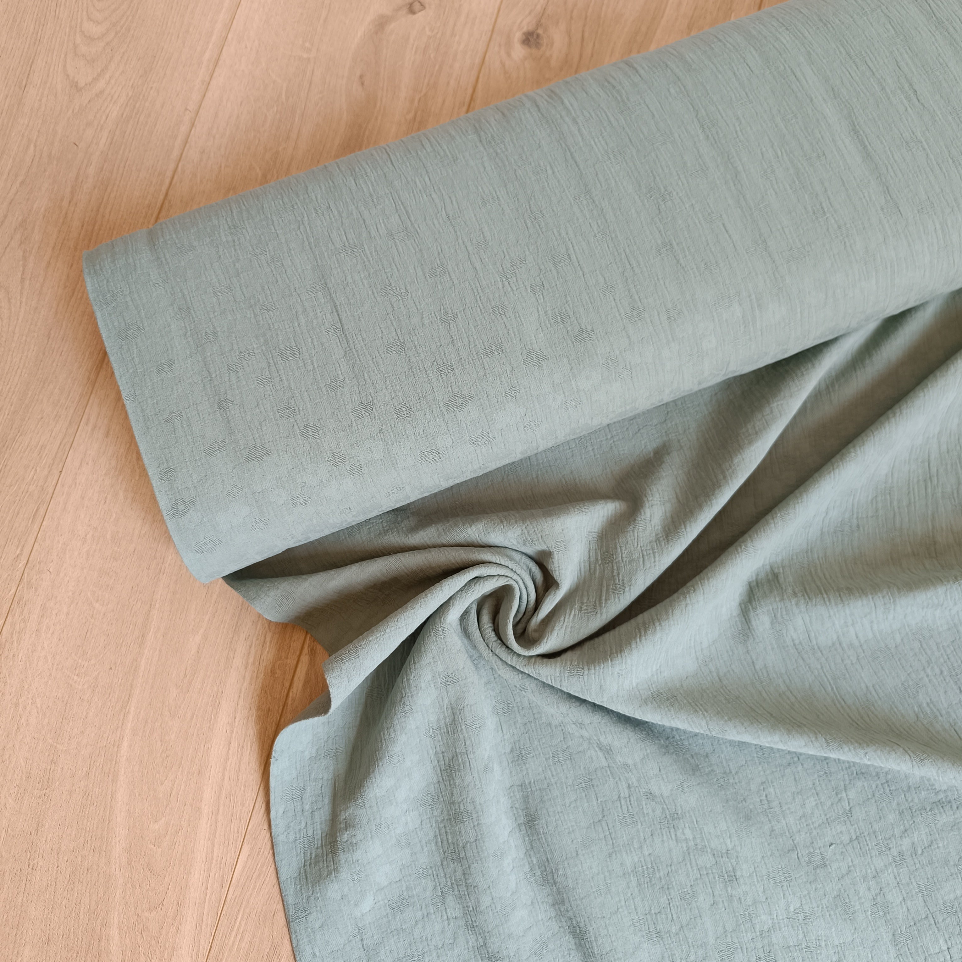 Double gauze melange jacquard oudgroen