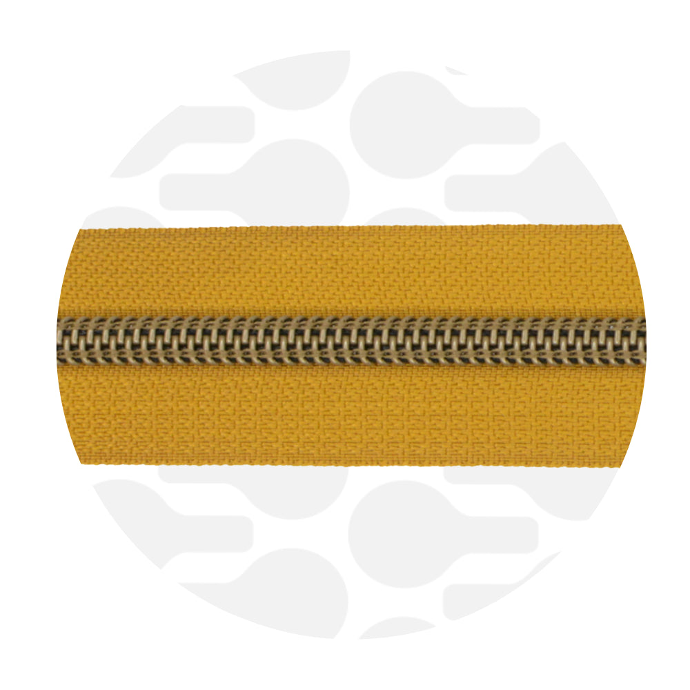 Zipper Nylon coil Ochre - Antique brass