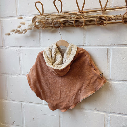 poncho peach spons